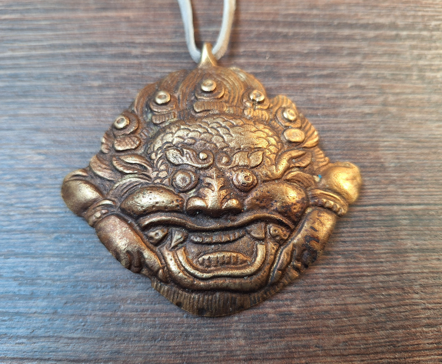 Vintage brass Cheppu pendant