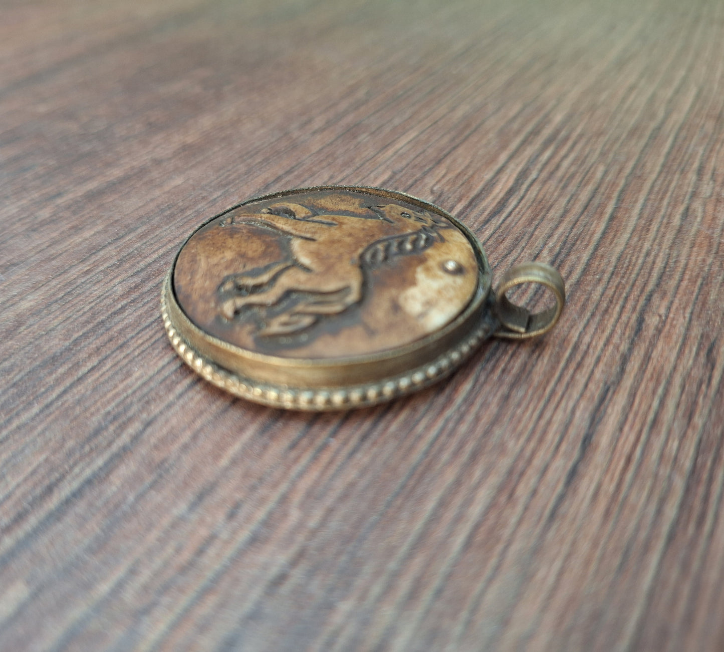 Vintage yak bone pendant Horse
