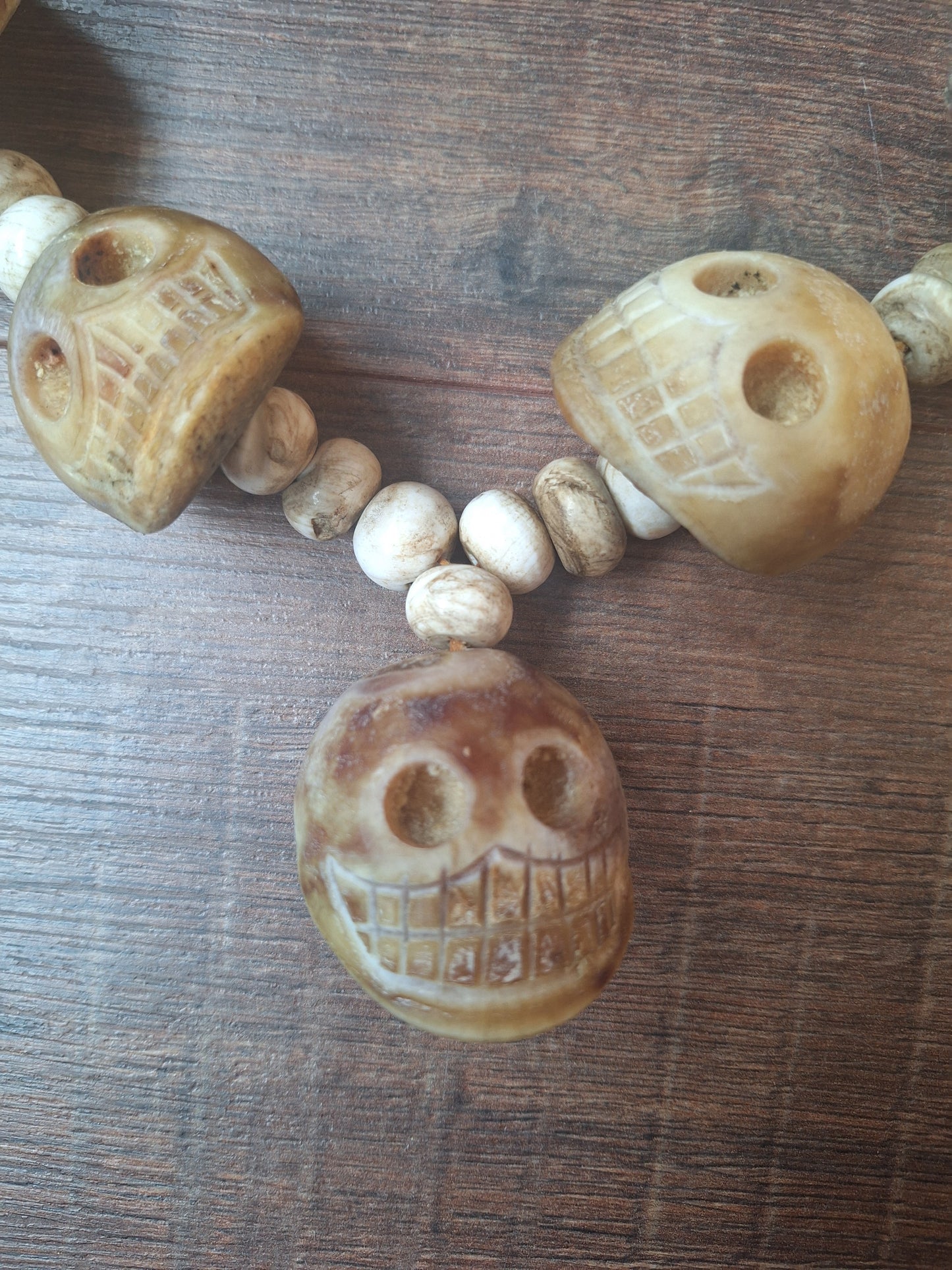 Vintage bone carved skull necklace
