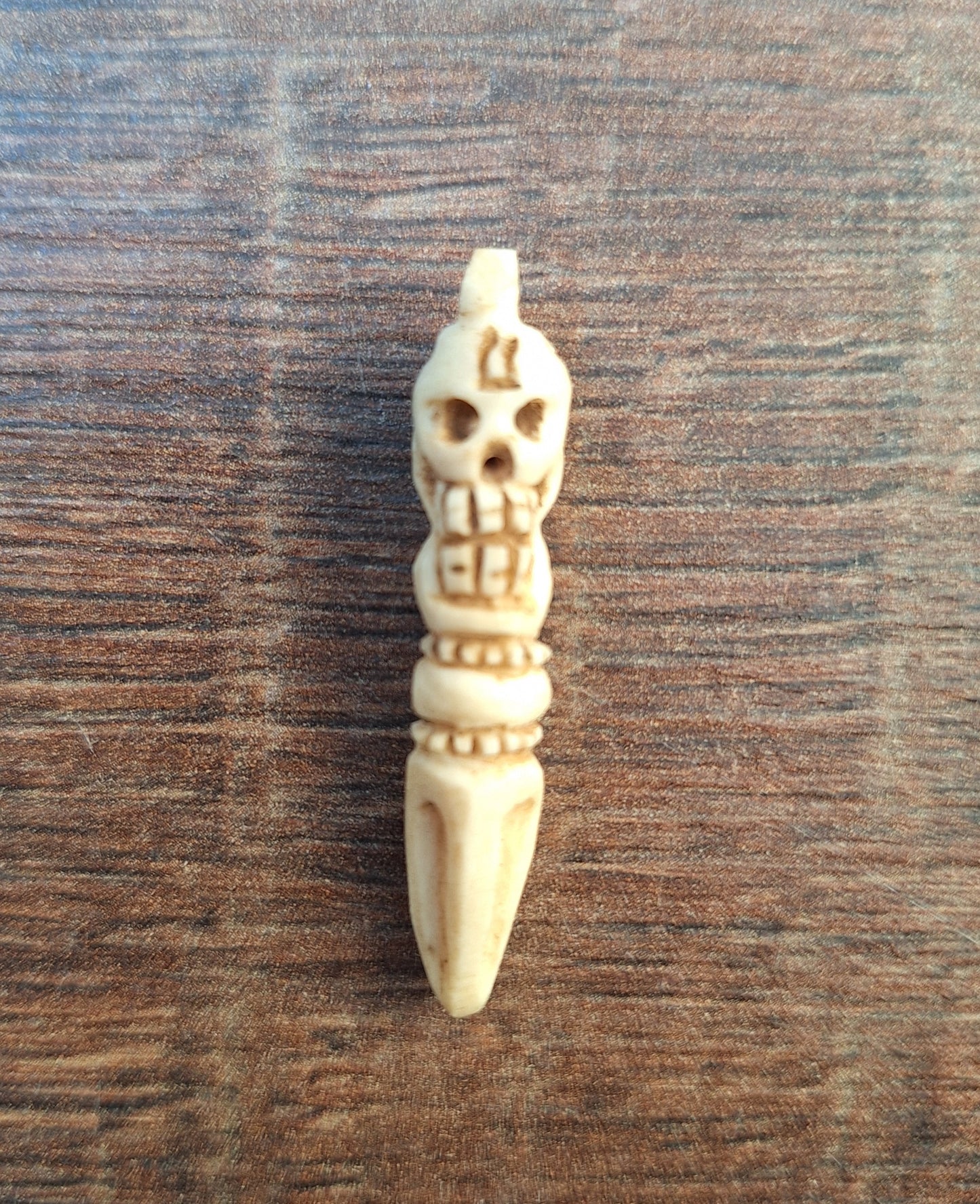 Vintage bone carved phurba pendant