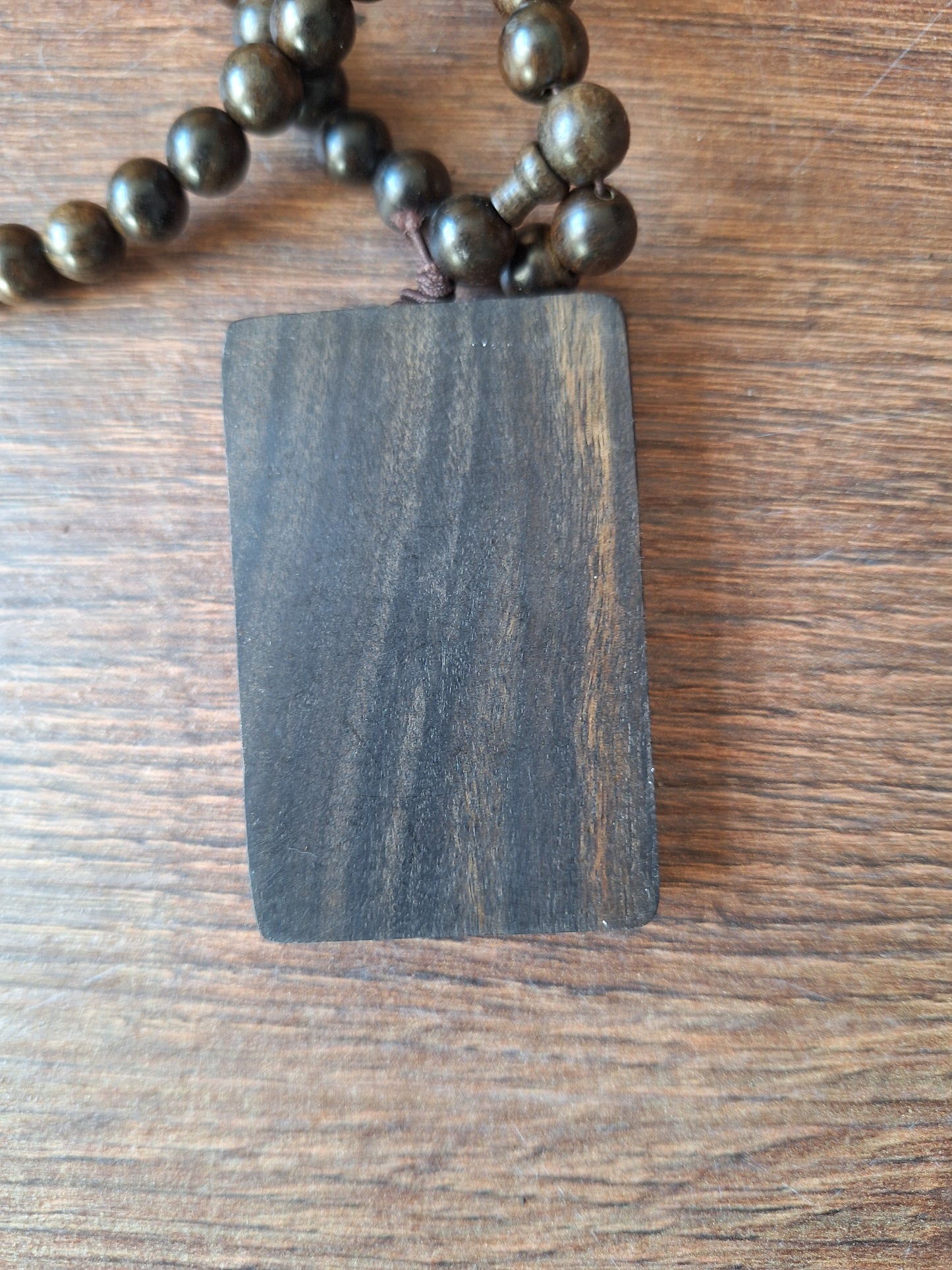 Agarwood mala with dragon pendant