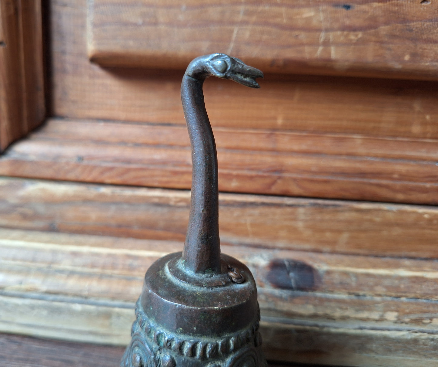 Vintage bronze altar bell with snake