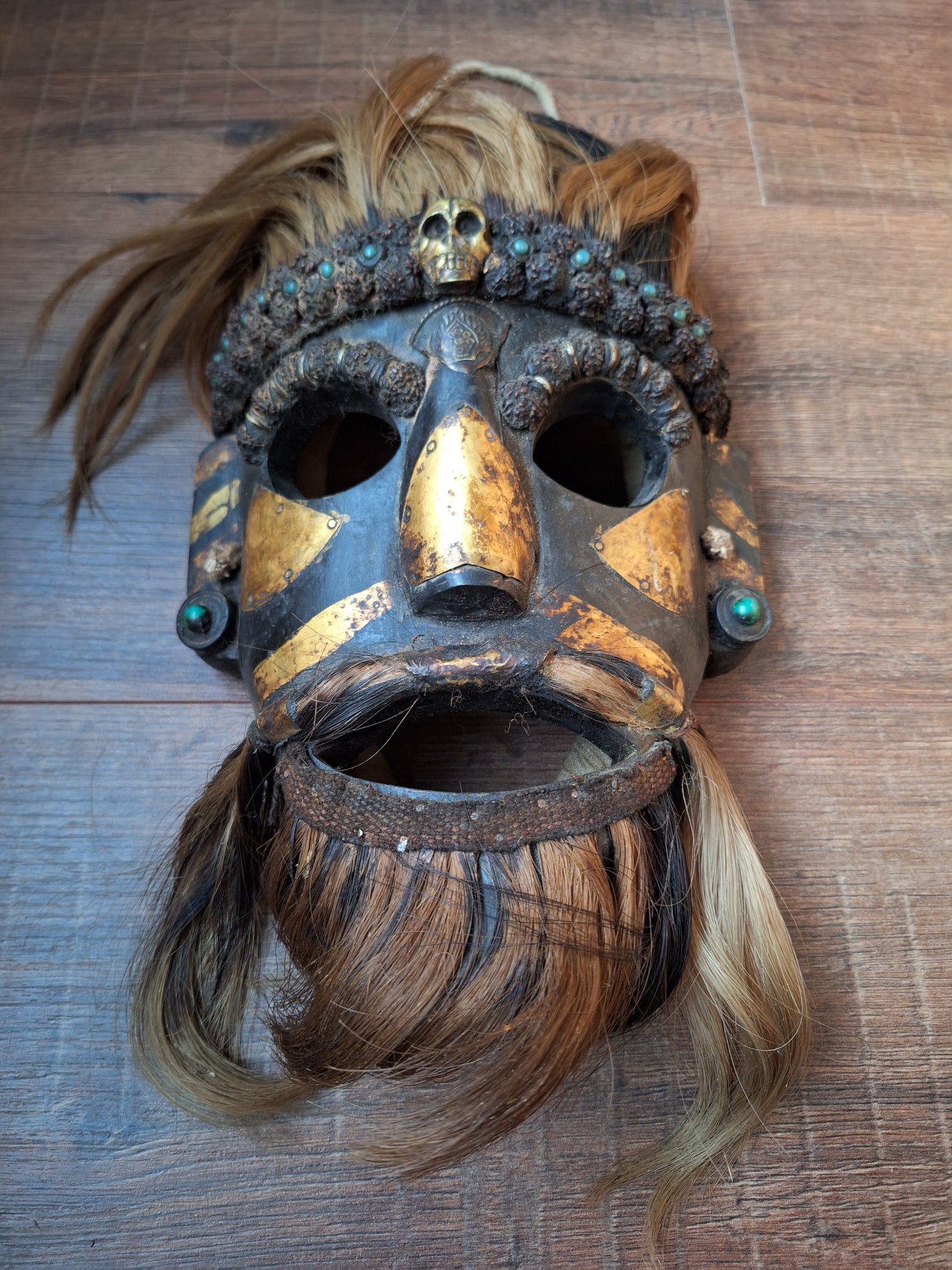 Vintage wooden wrathful spirit mask with metal plating, beads and yak hair
