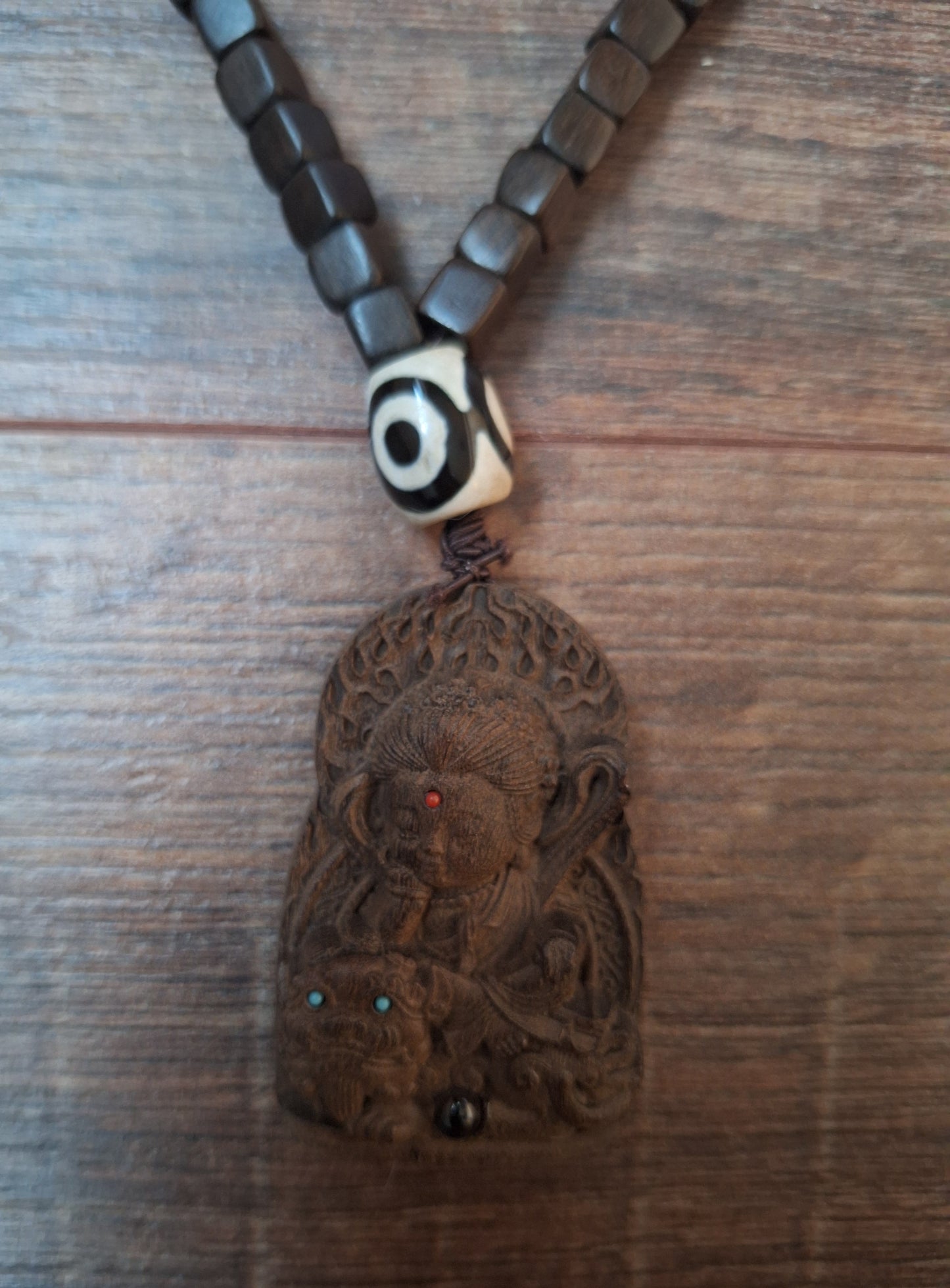Wooden mala with Guanyin pendant