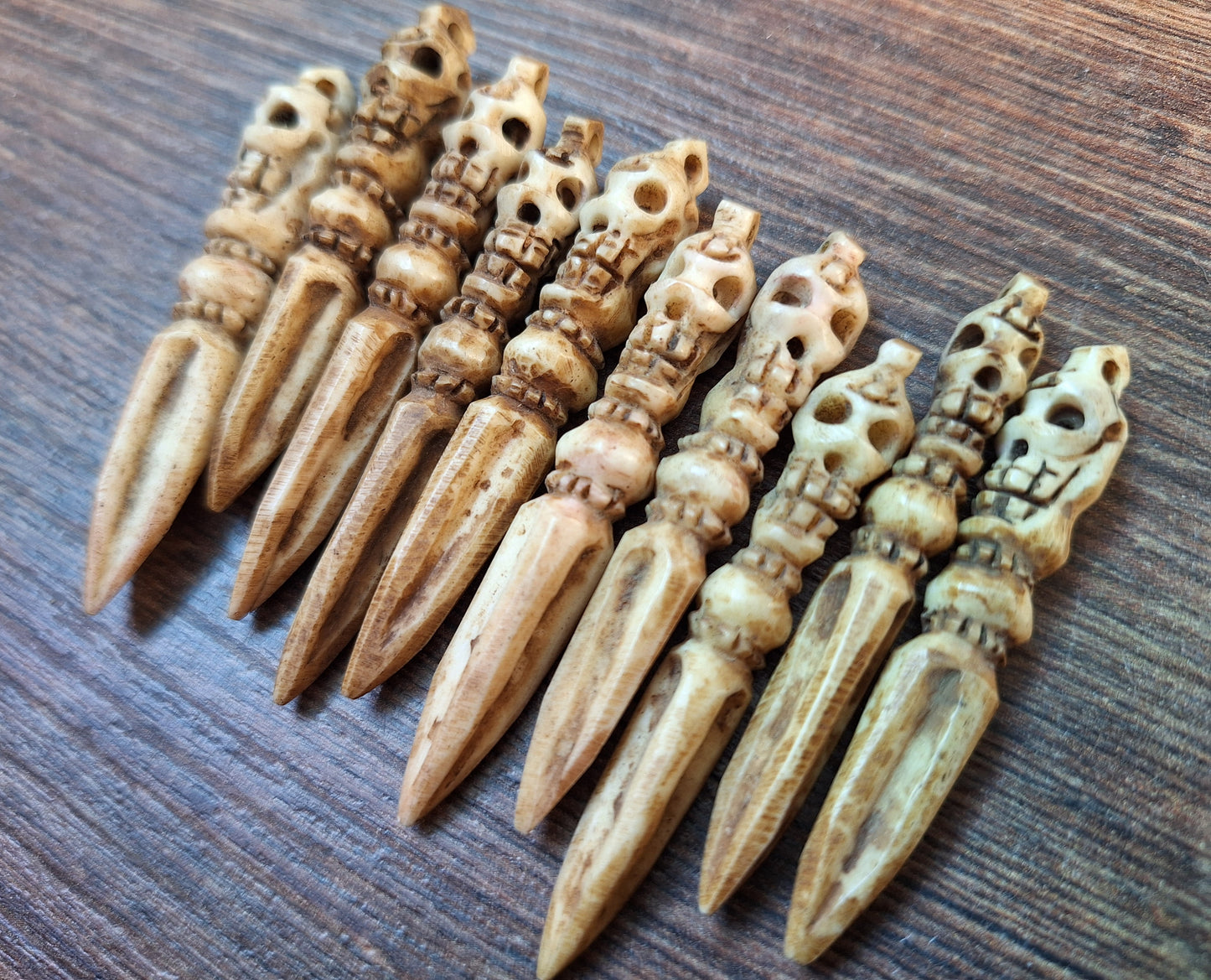 Vintage bone carved phurba pendant