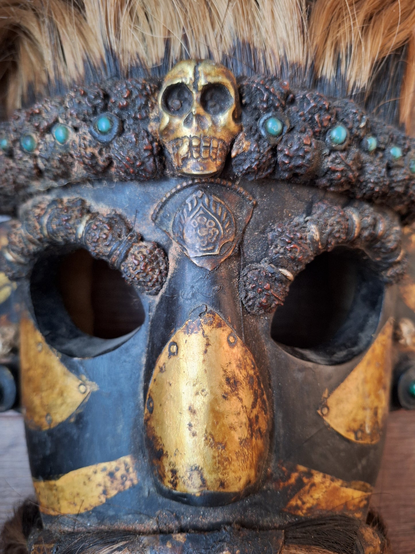Vintage wooden wrathful spirit mask with metal plating, beads and yak hair