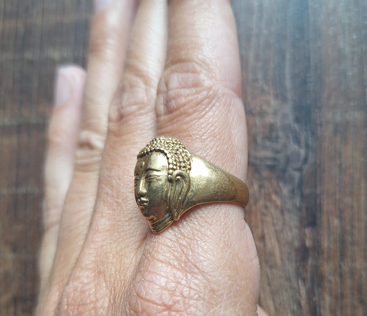 Brass ring Buddha