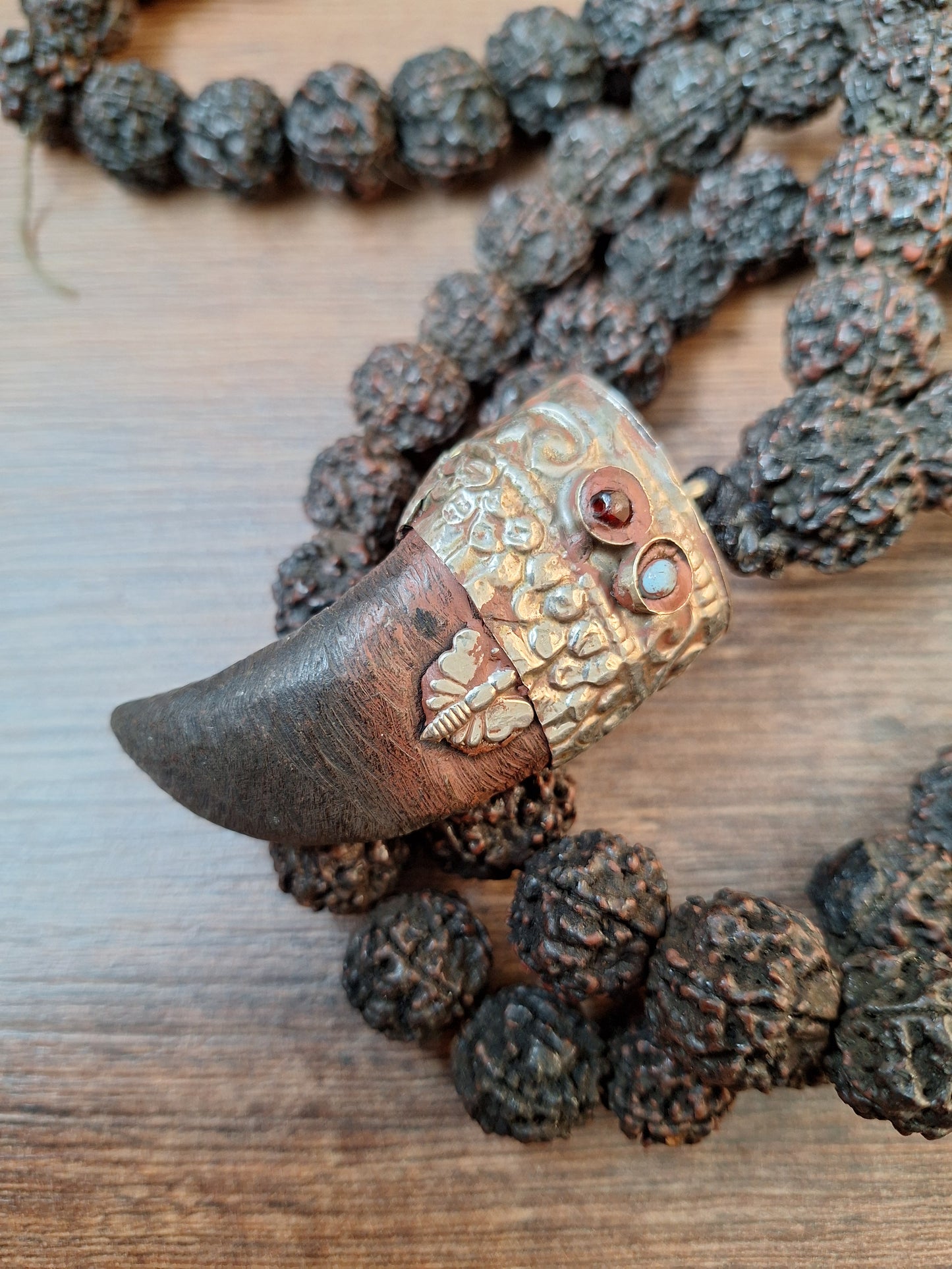 Vintage Nepalese rudraksha mala with horn pendant