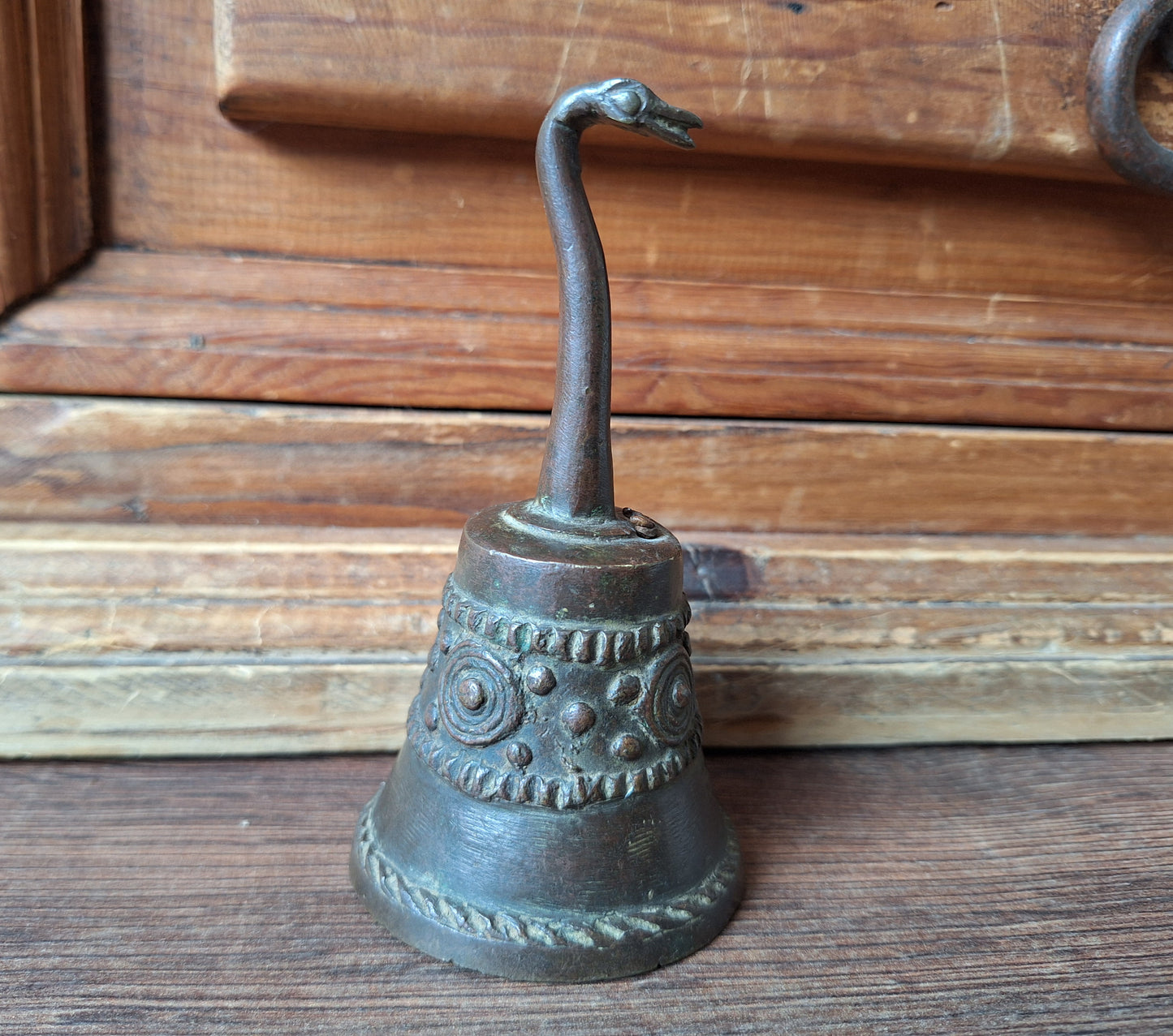 Vintage bronze altar bell with snake