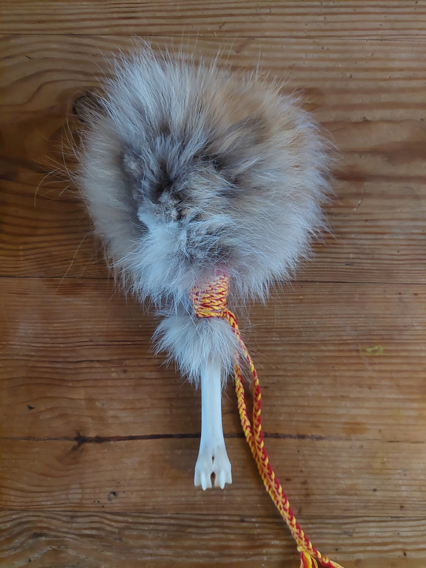 Fox fur and roe deer leg bone rattle