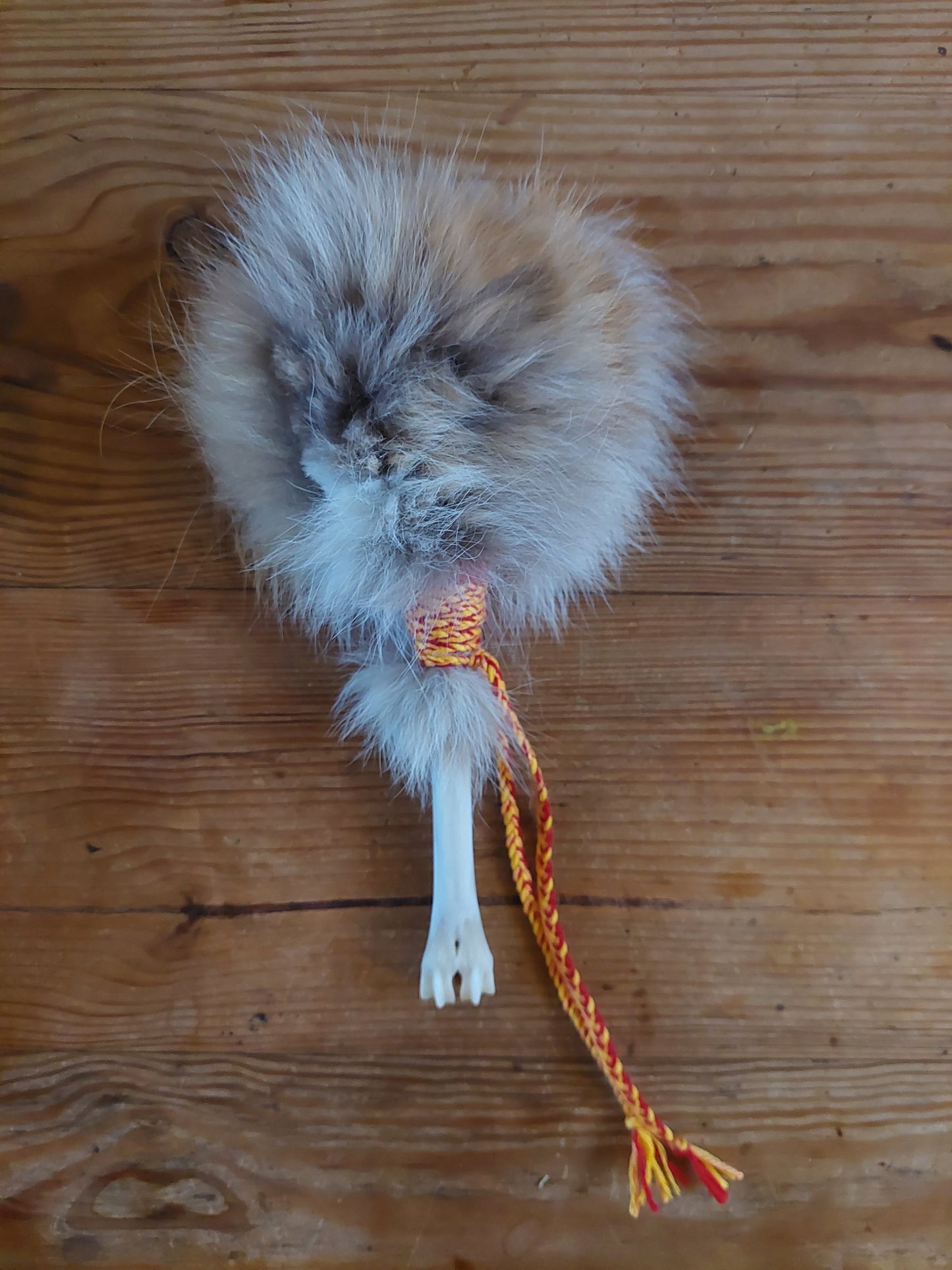 Fox fur and roe deer leg bone rattle