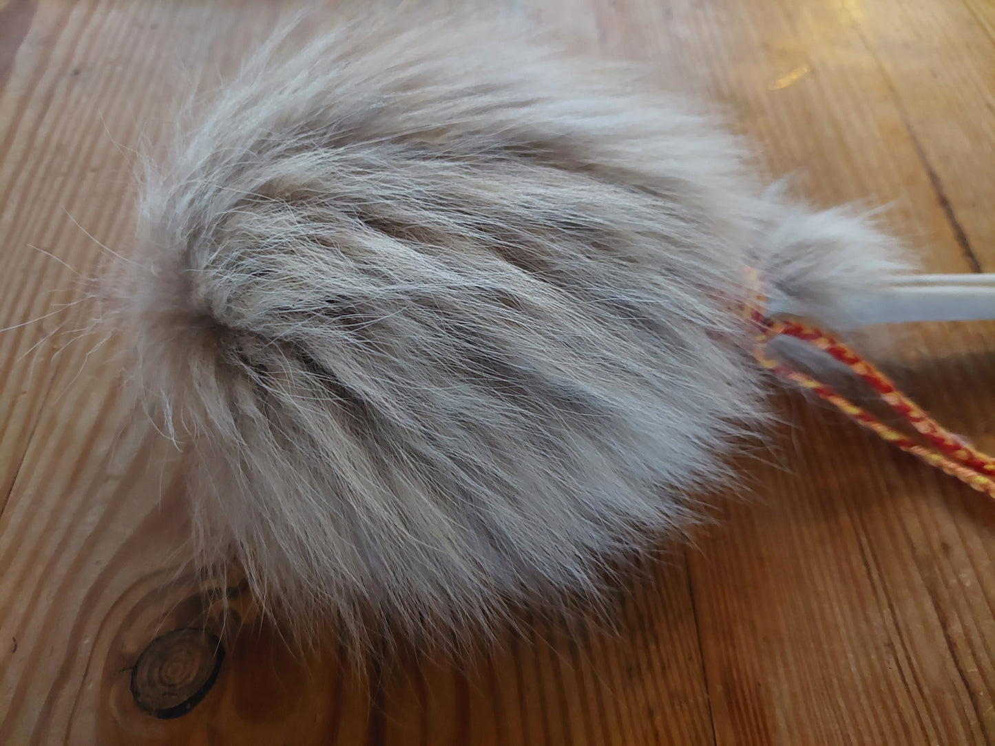 Fox fur and roe deer leg bone rattle