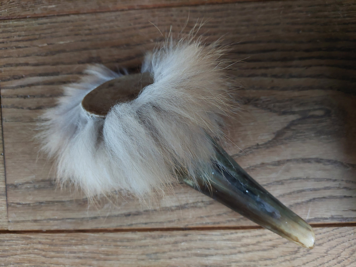 Cow horn and fox fur rattle