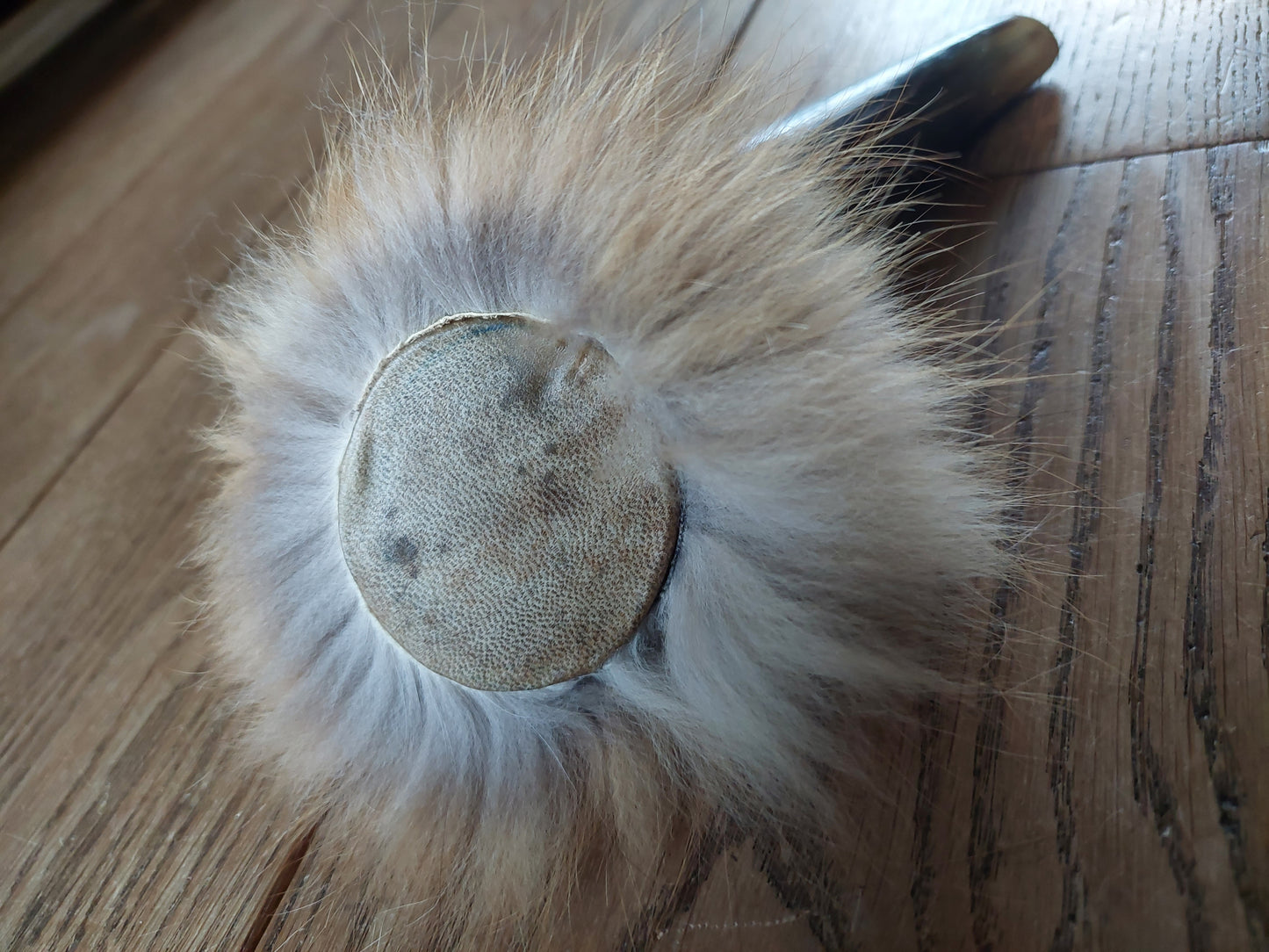 Cow horn and fox fur rattle