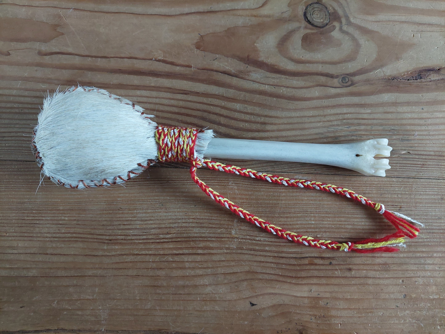 Horse hide and roe deer leg bone rattle