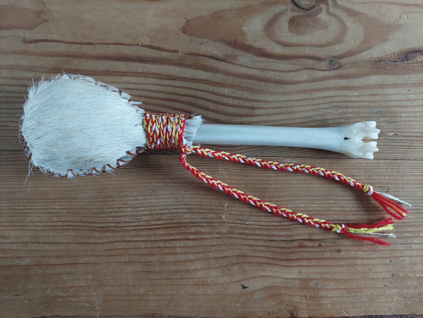 Horse hide and roe deer leg bone rattle