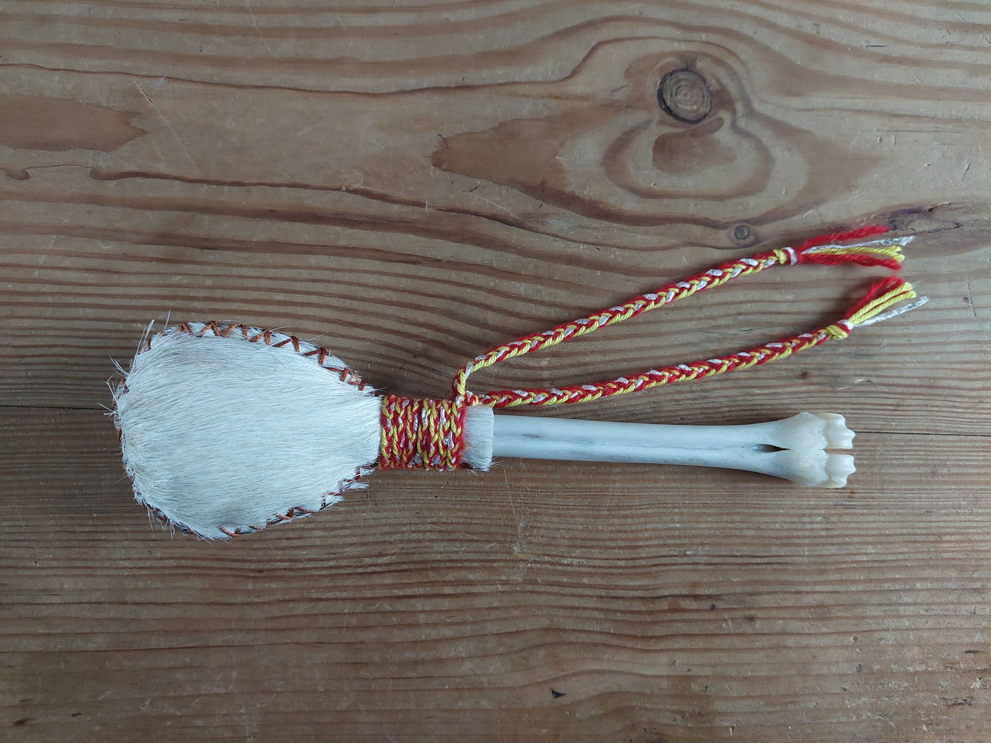 Horse hide and roe deer leg bone rattle