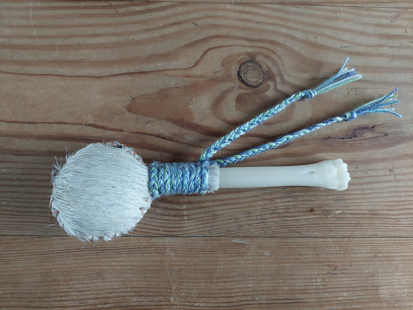 Horse hide and roe deer leg bone rattle