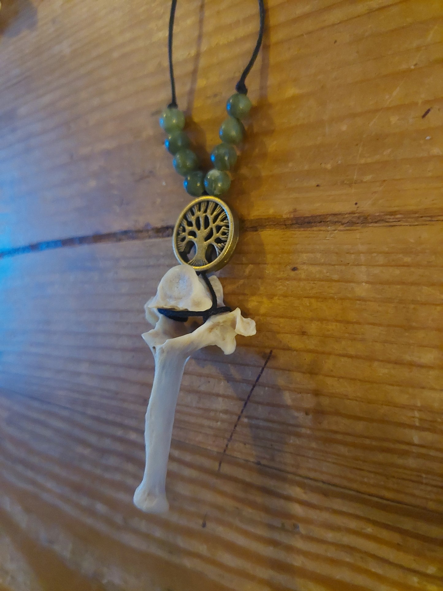 Fox vertebra with green jade and tree of life amulet necklace