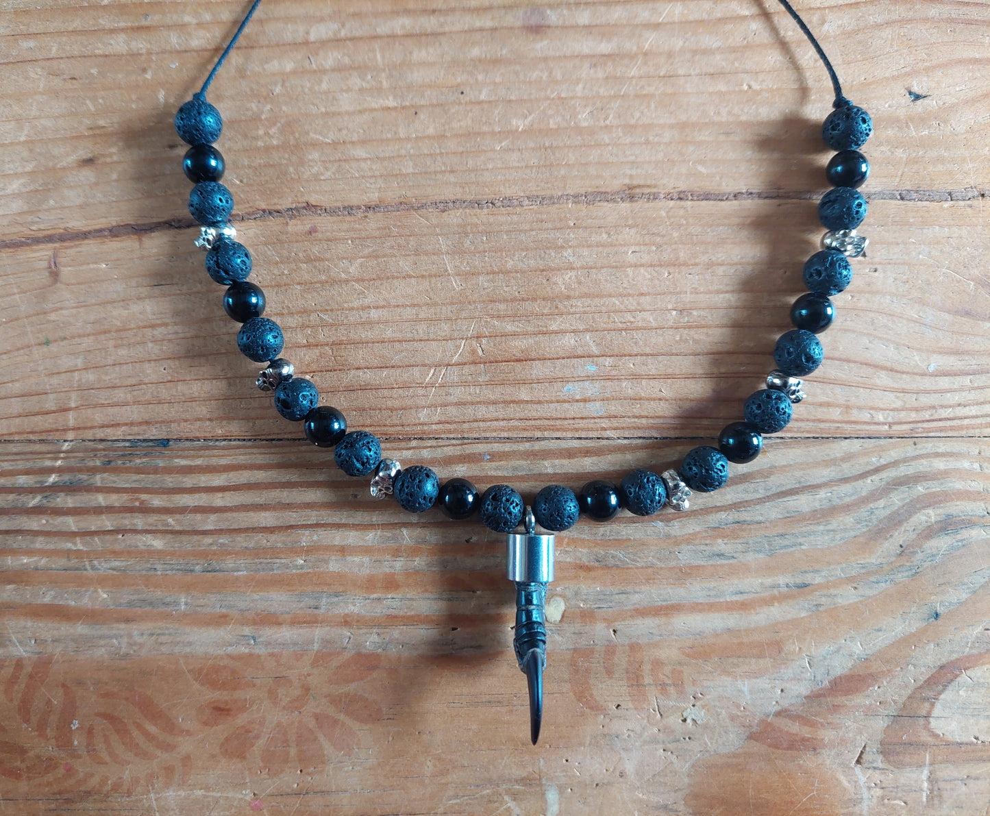 Crow nail with lava stone and obsidian amulet necklace