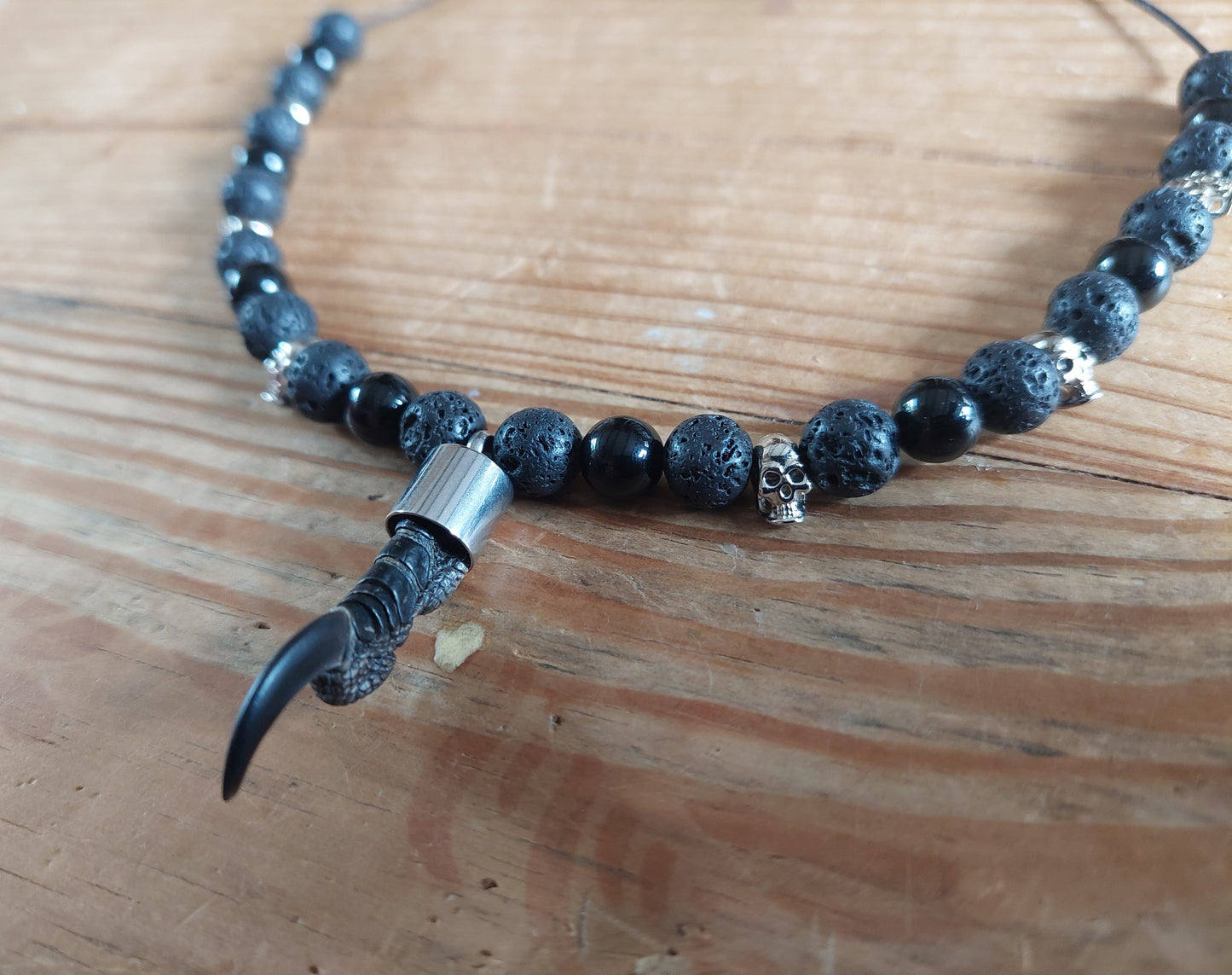 Crow nail with lava stone and obsidian amulet necklace