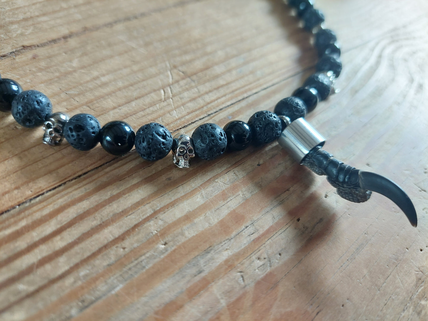 Crow nail with lava stone and obsidian amulet necklace