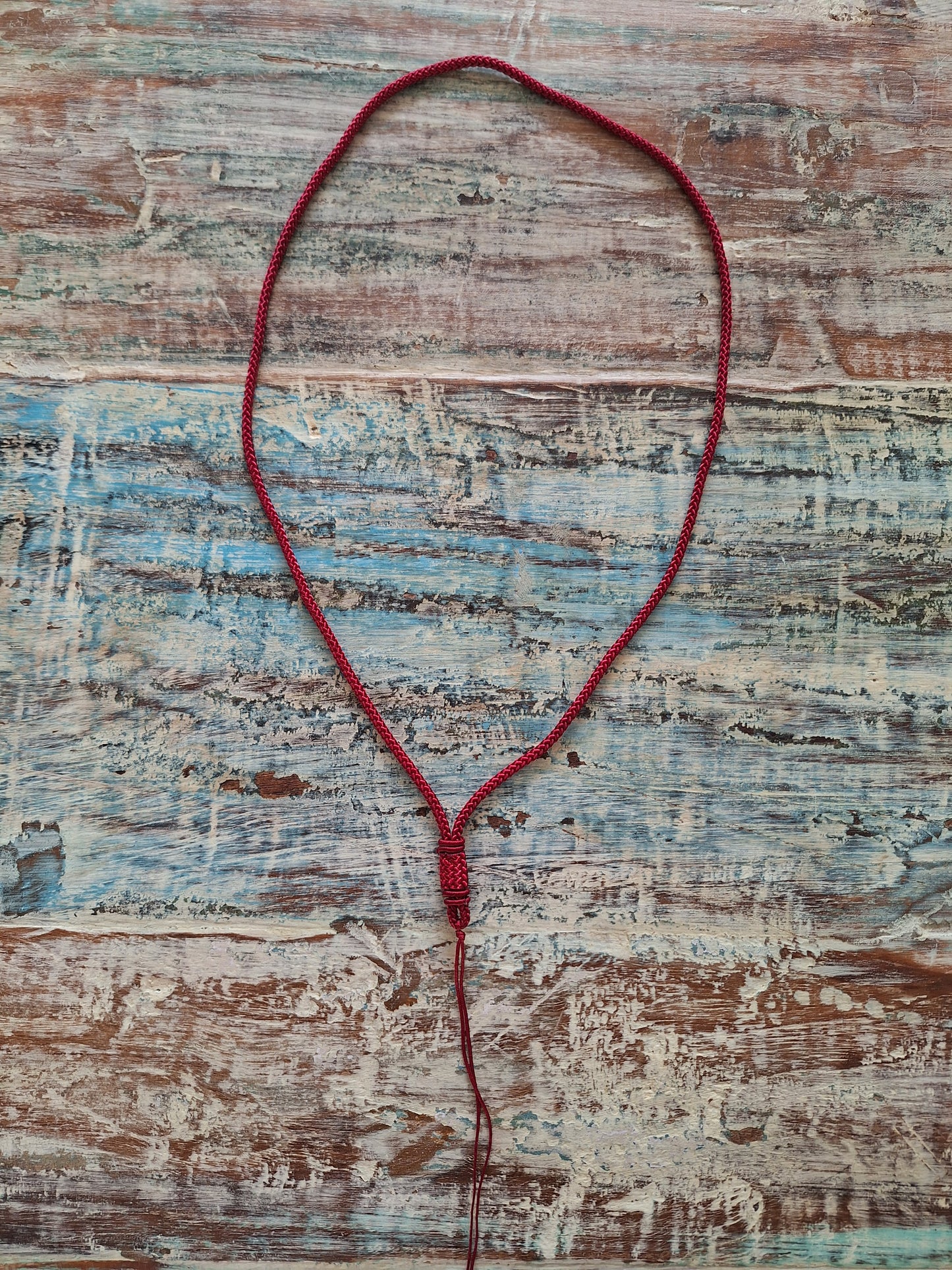 Amulet cord red with weaving