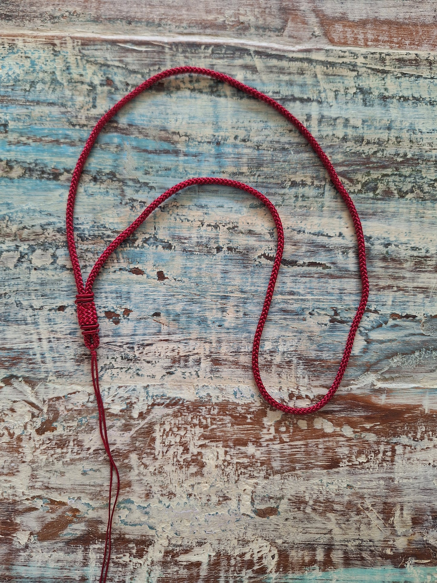 Amulet cord red with weaving