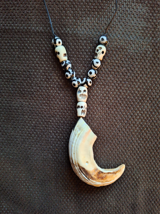 Wild boar tusk with yak bone skull beads amulet necklace