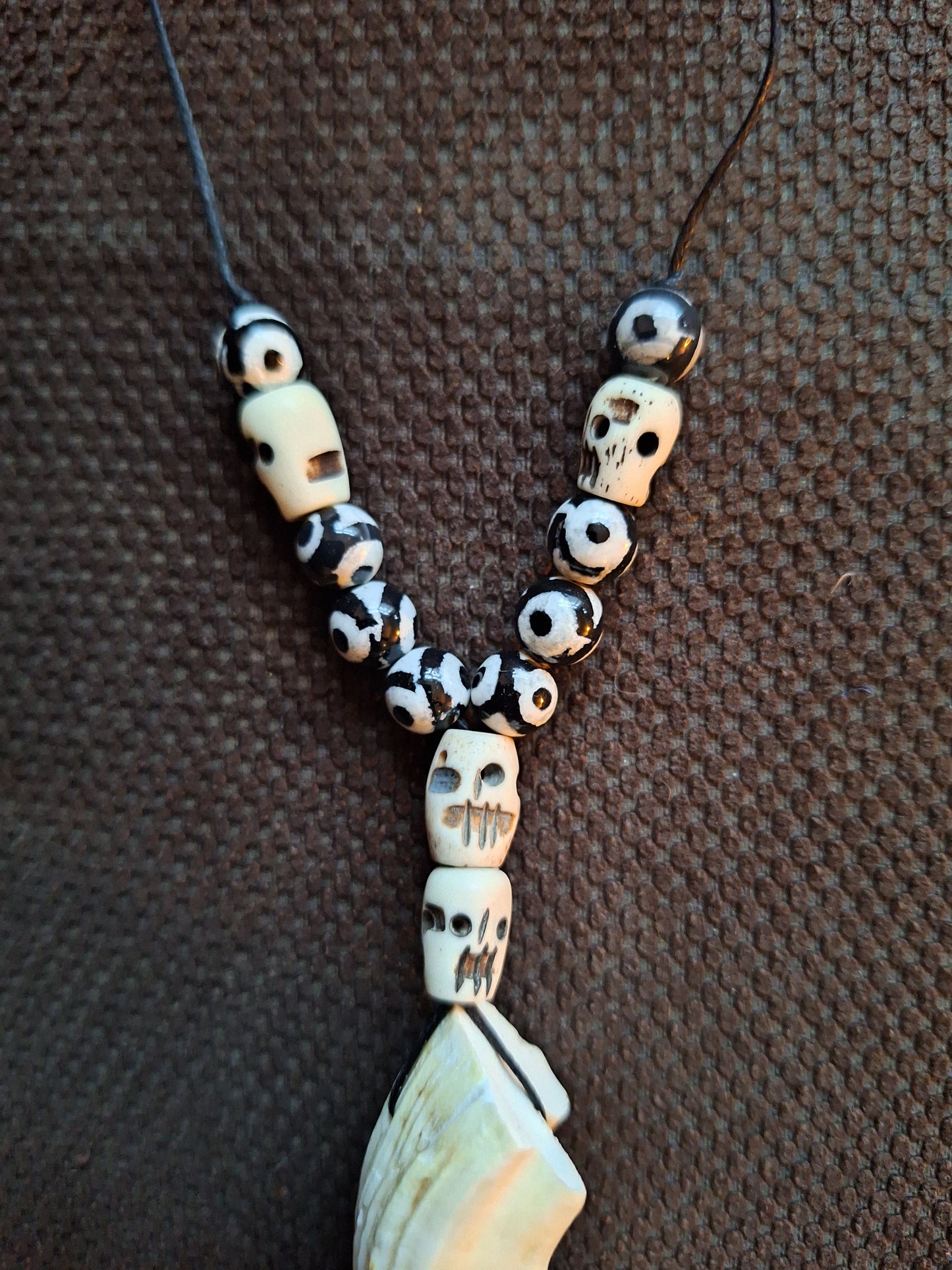 Wild boar tusk with yak bone skull beads amulet necklace