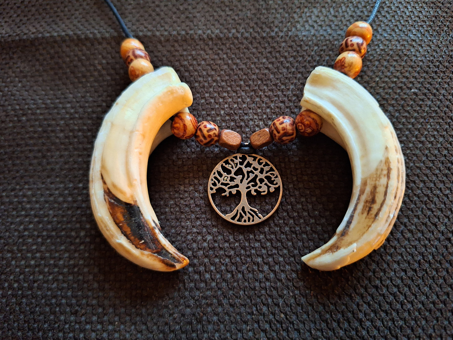 Wild boar tusks and tree of life amulet necklace