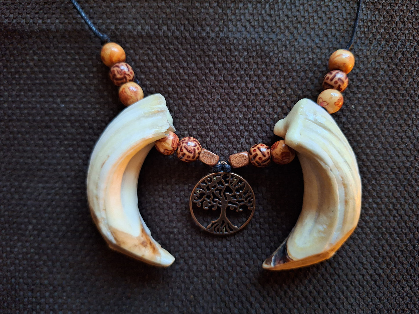 Wild boar tusks and tree of life amulet necklace