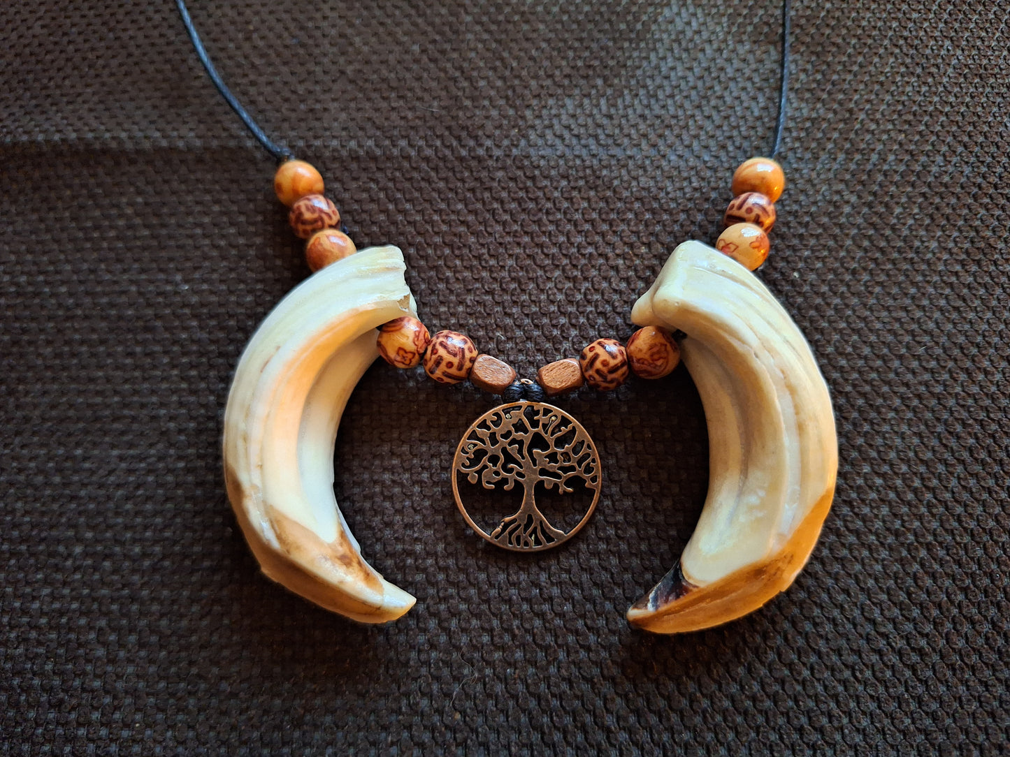 Wild boar tusks and tree of life amulet necklace