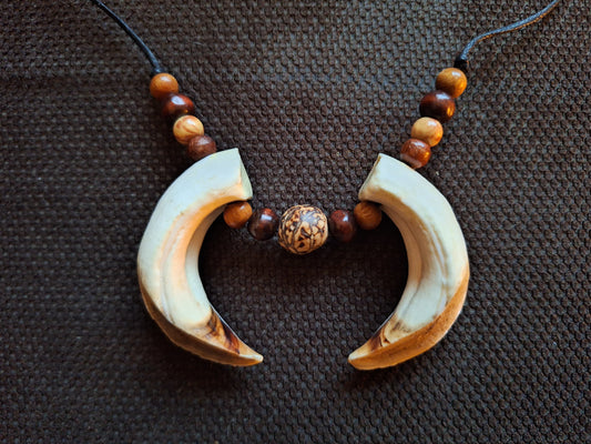 Wild boar tusks amulet necklace