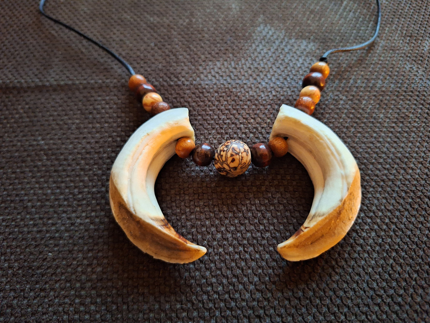 Wild boar tusks amulet necklace