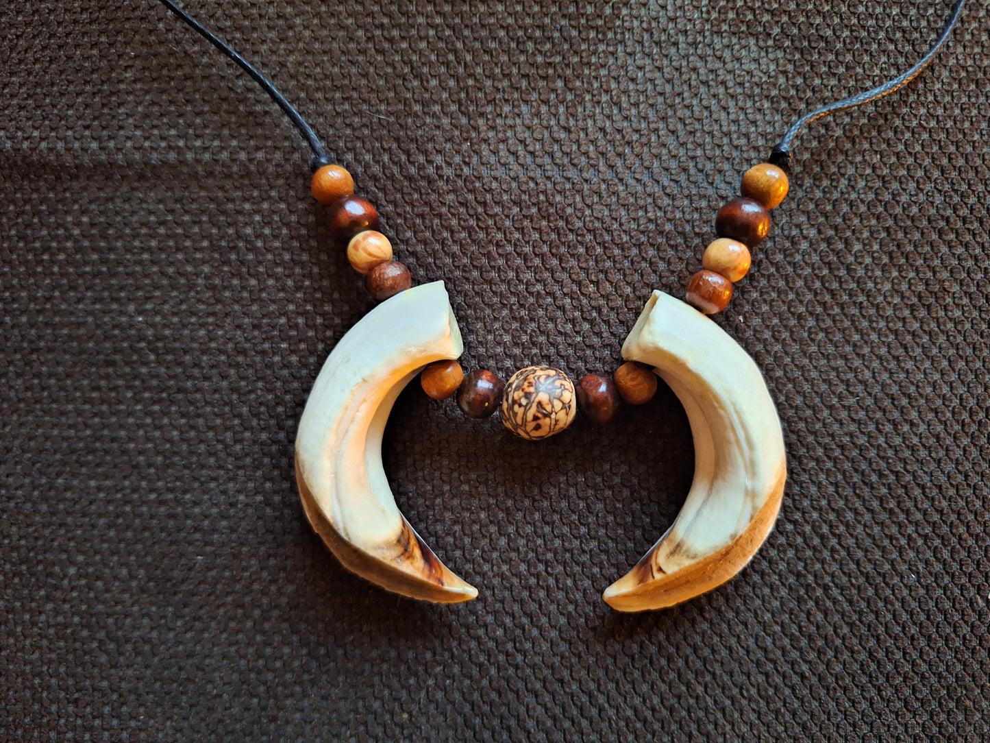 Wild boar tusks amulet necklace