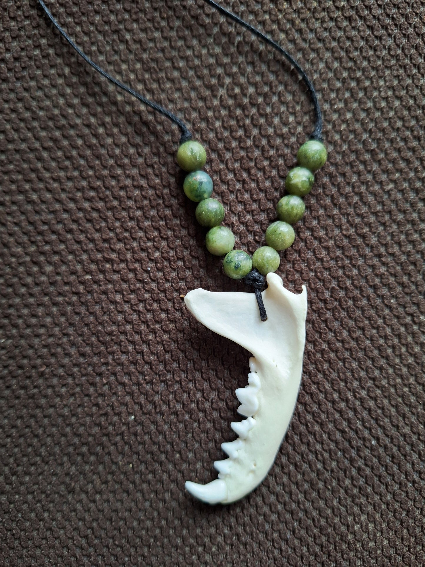 Marten jaw bone and jade amulet necklace