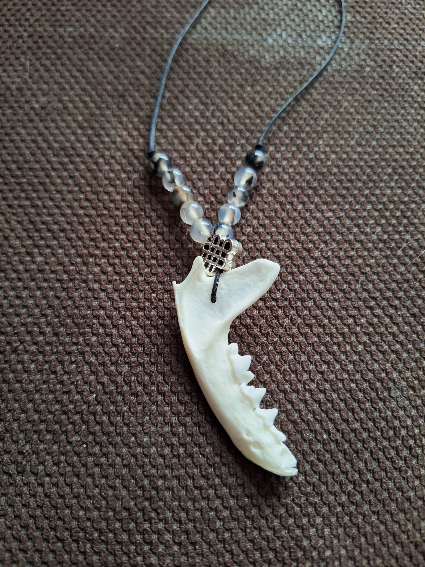 Marten jaw bone with dragon veins agate and endless knot amulet necklace