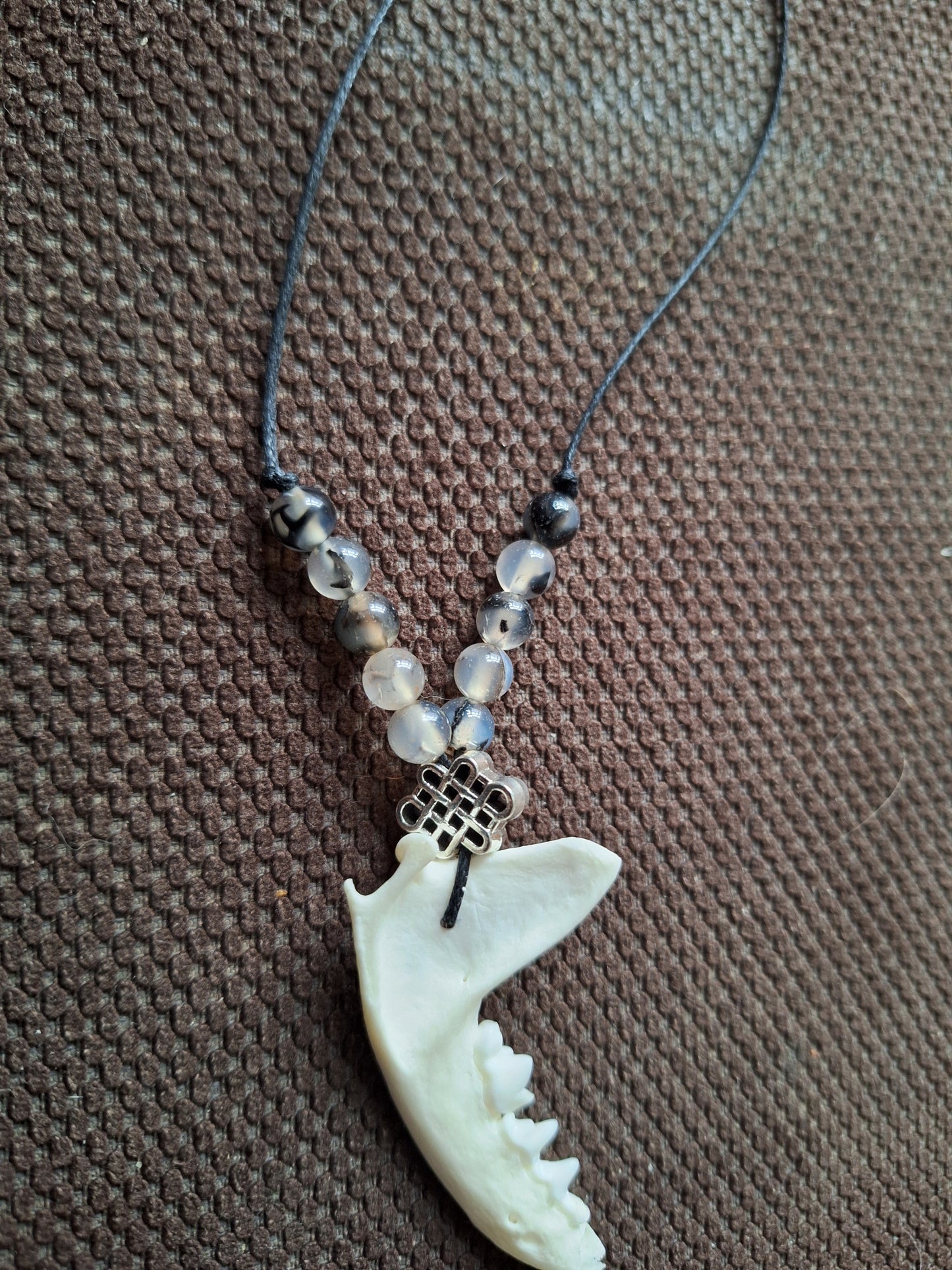 Marten jaw bone with dragon veins agate and endless knot amulet necklace