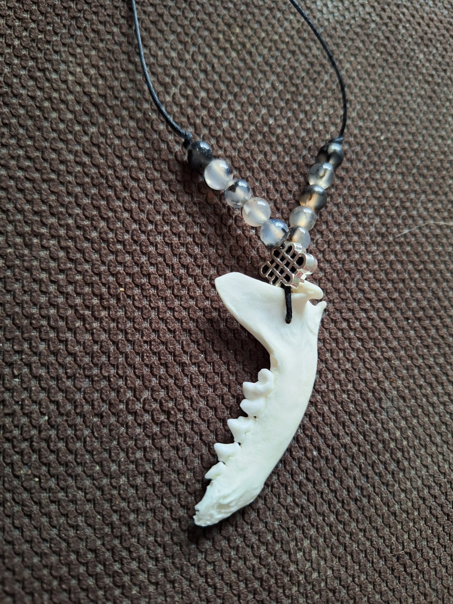 Marten jaw bone with dragon veins agate and endless knot amulet necklace