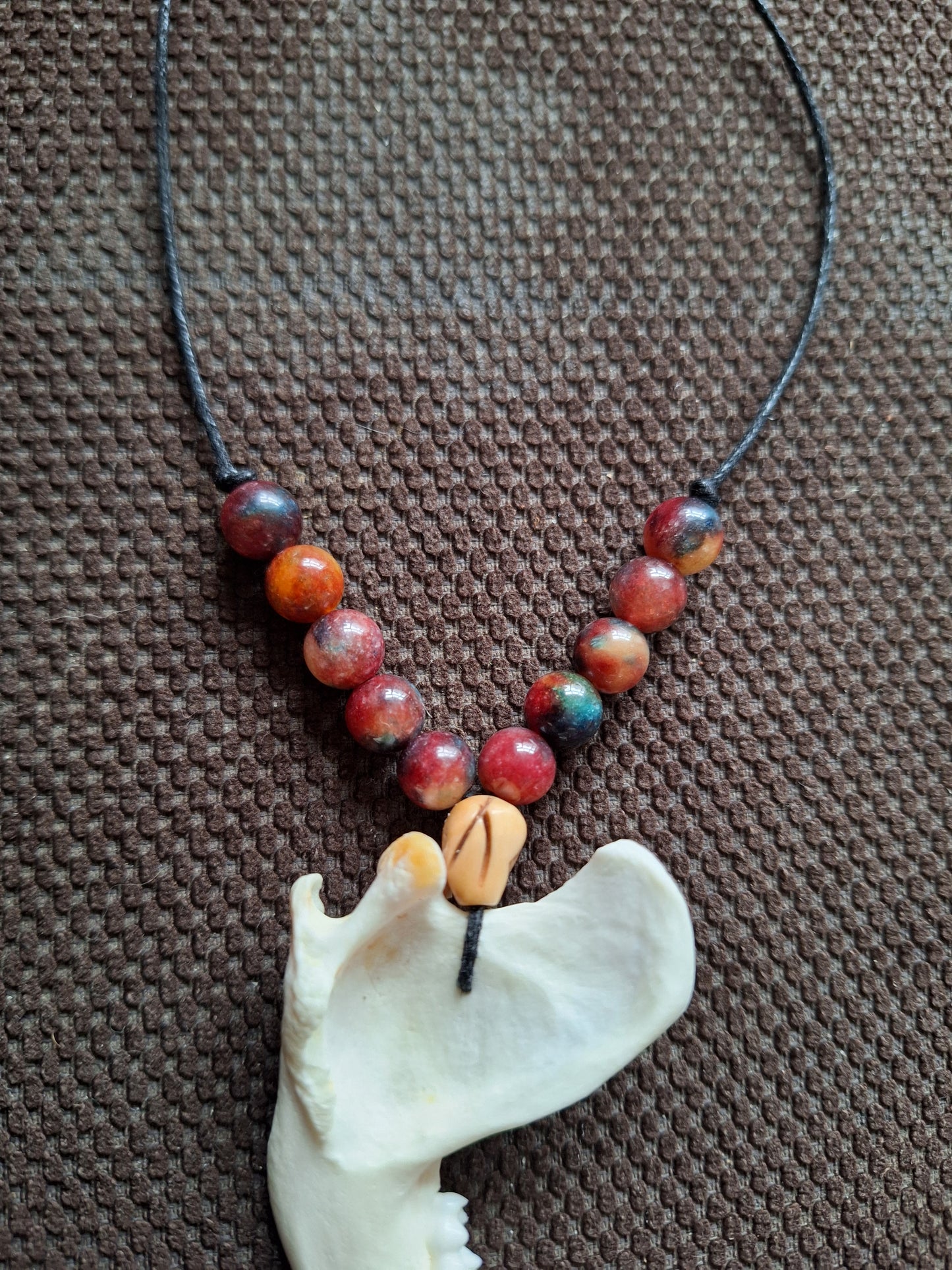 Racoon jaw bone and dragon's blood stone amulet necklace #2