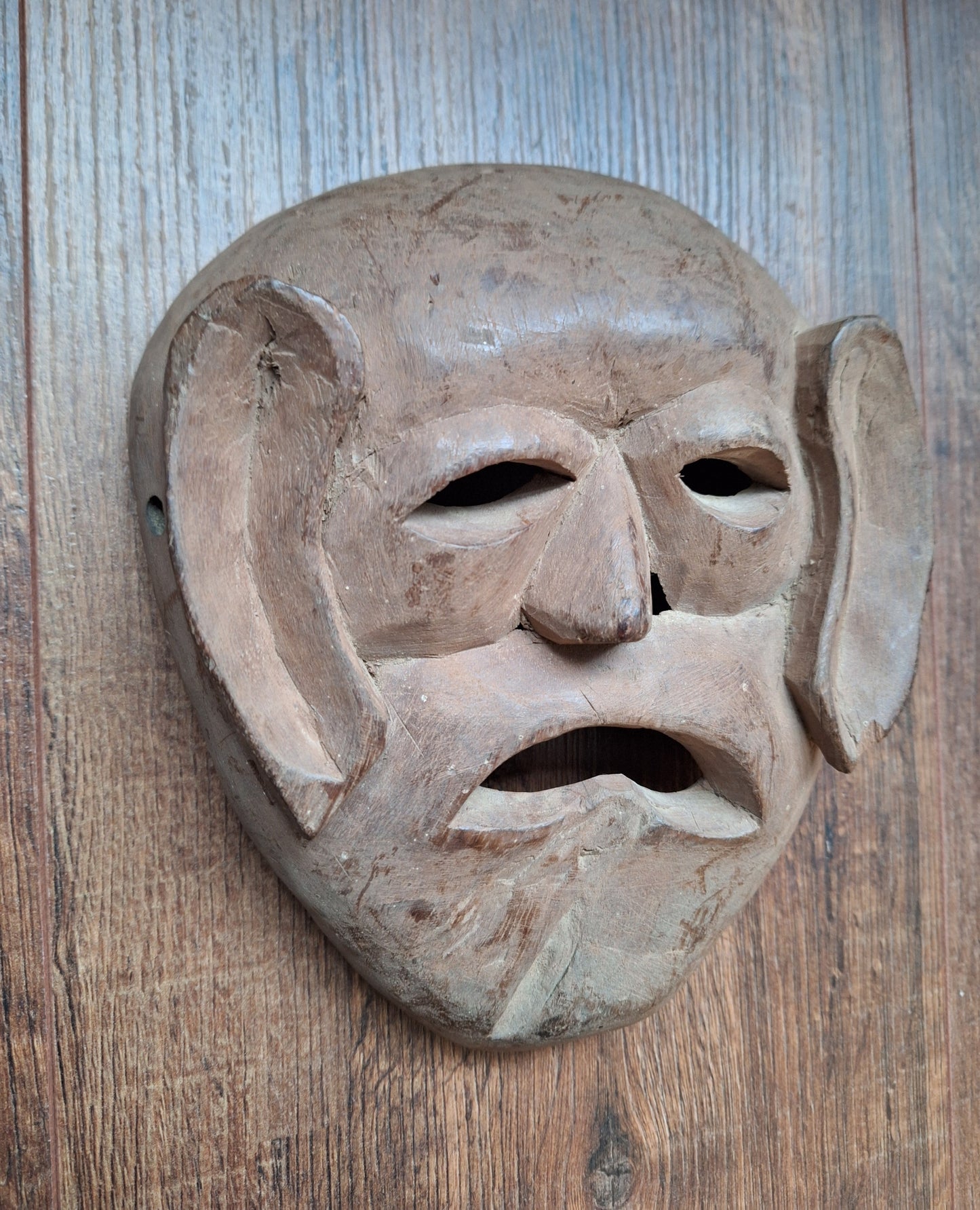 Vintage wooden Tharu tribal festival mask