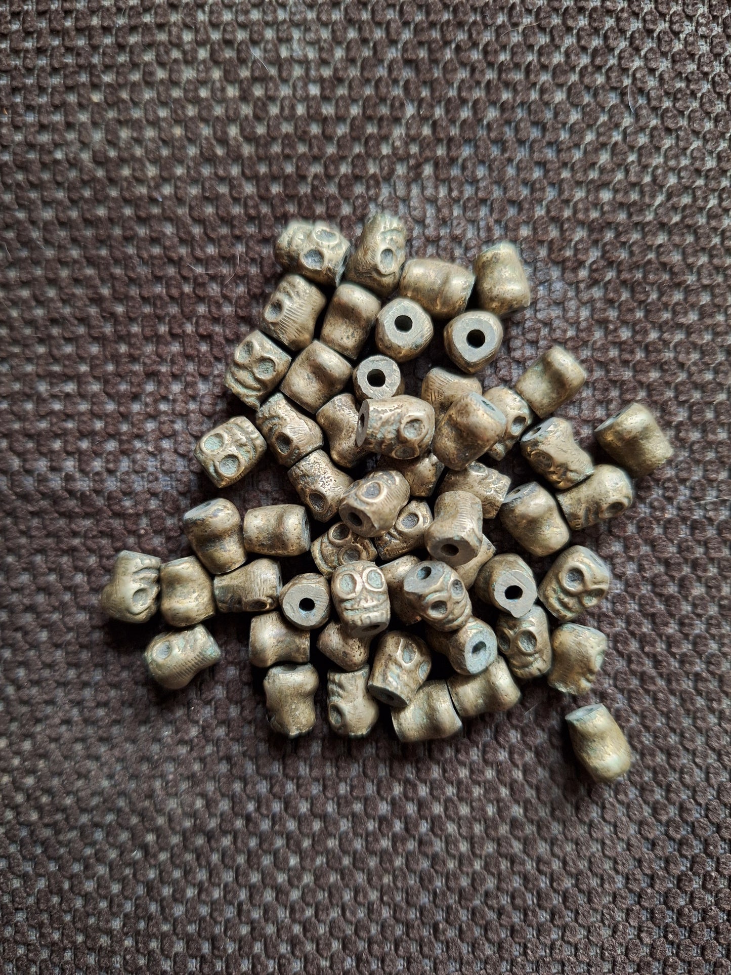 Vintage bronze skull beads, set of 10