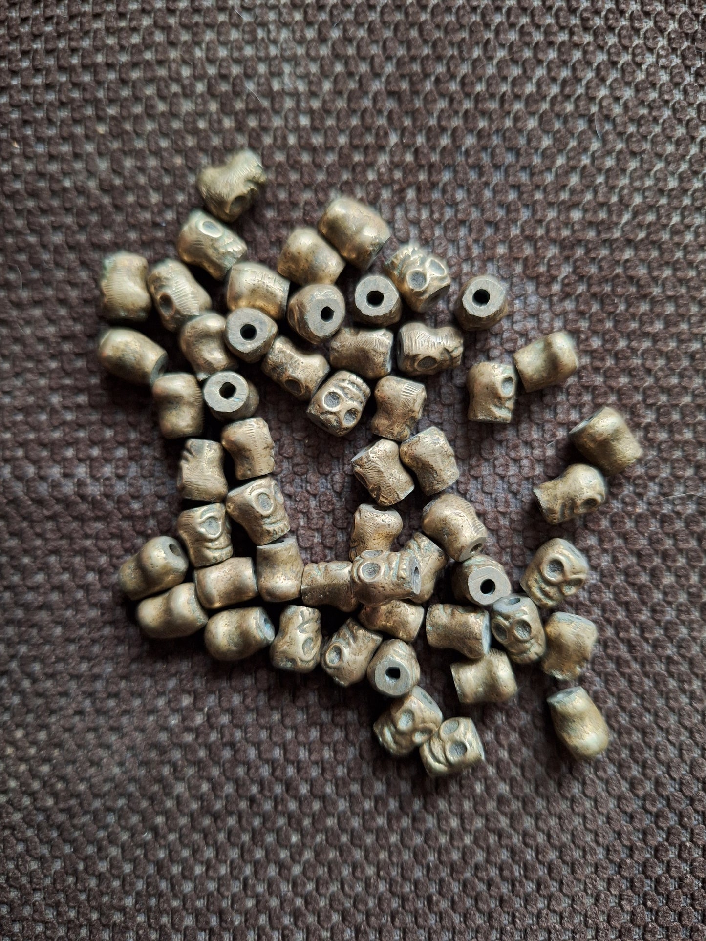 Vintage bronze skull beads, set of 10