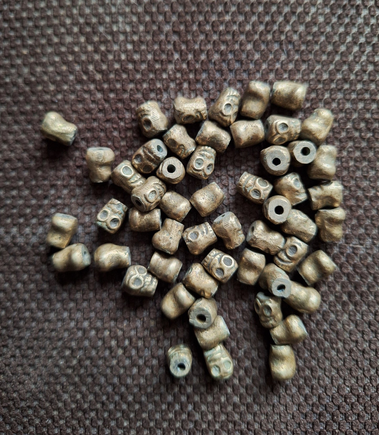 Vintage bronze skull beads, set of 10
