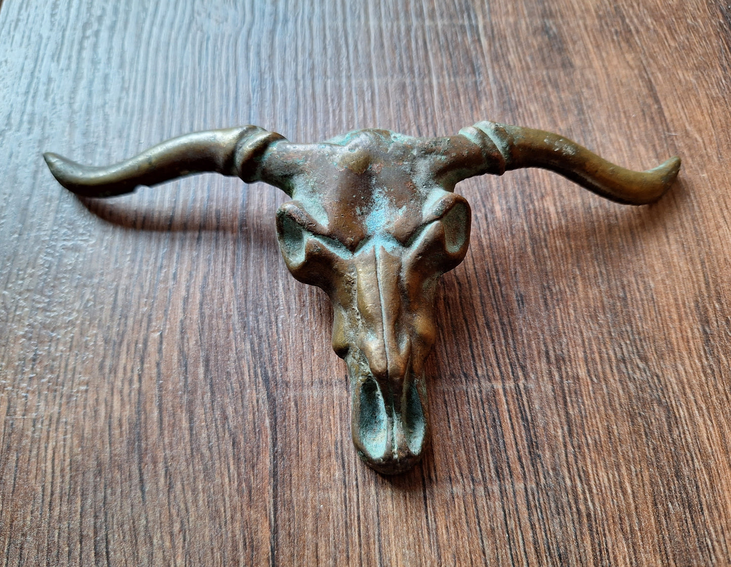 Old bronze bull belt buckle