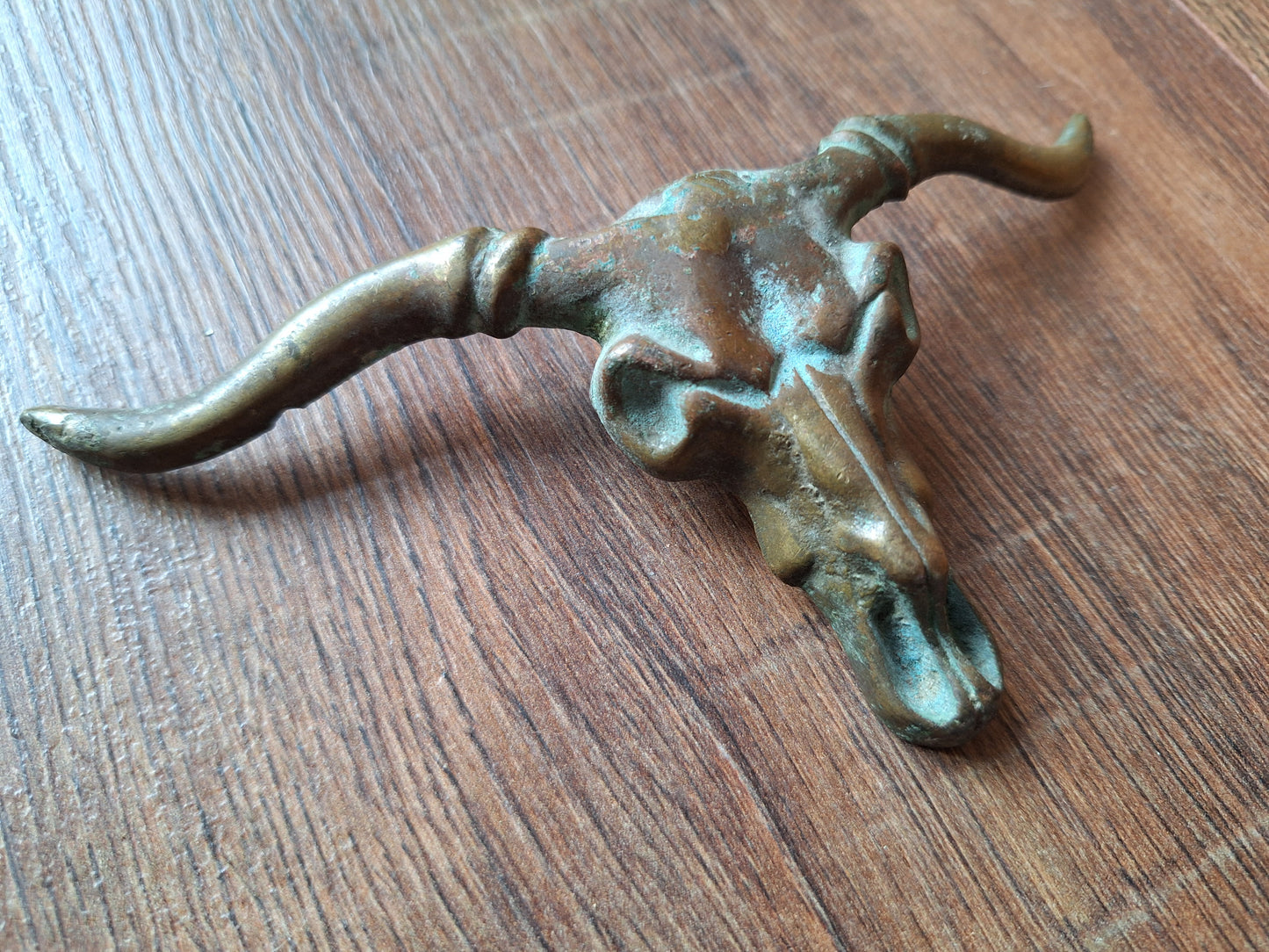 Old bronze bull belt buckle