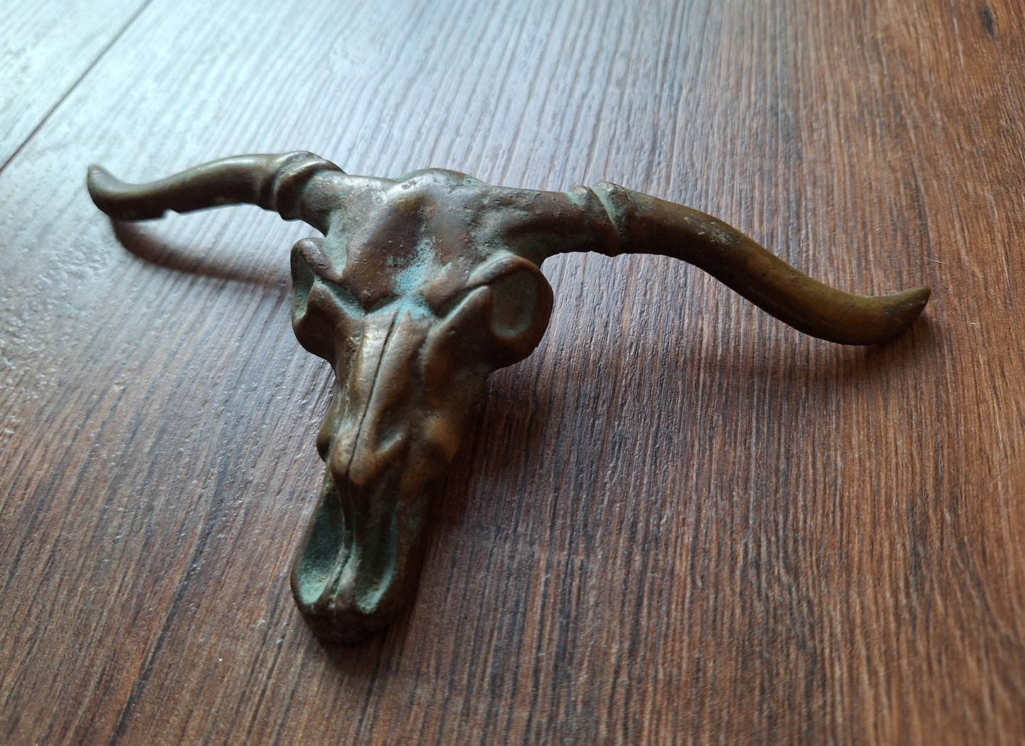 Old bronze bull belt buckle