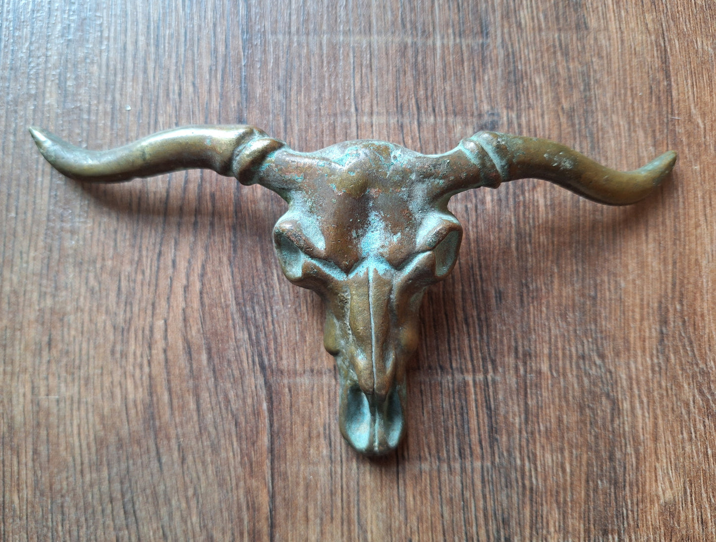 Old bronze bull belt buckle