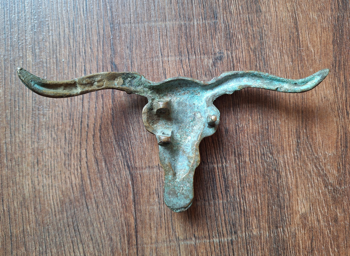 Old bronze bull belt buckle